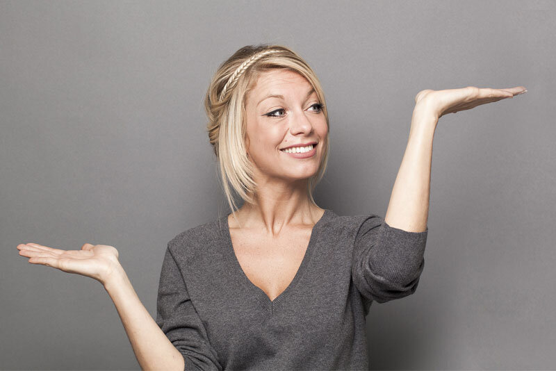 woman-using-hands-to-show-a-comparison Woman Using Hands to Show a Comparison
