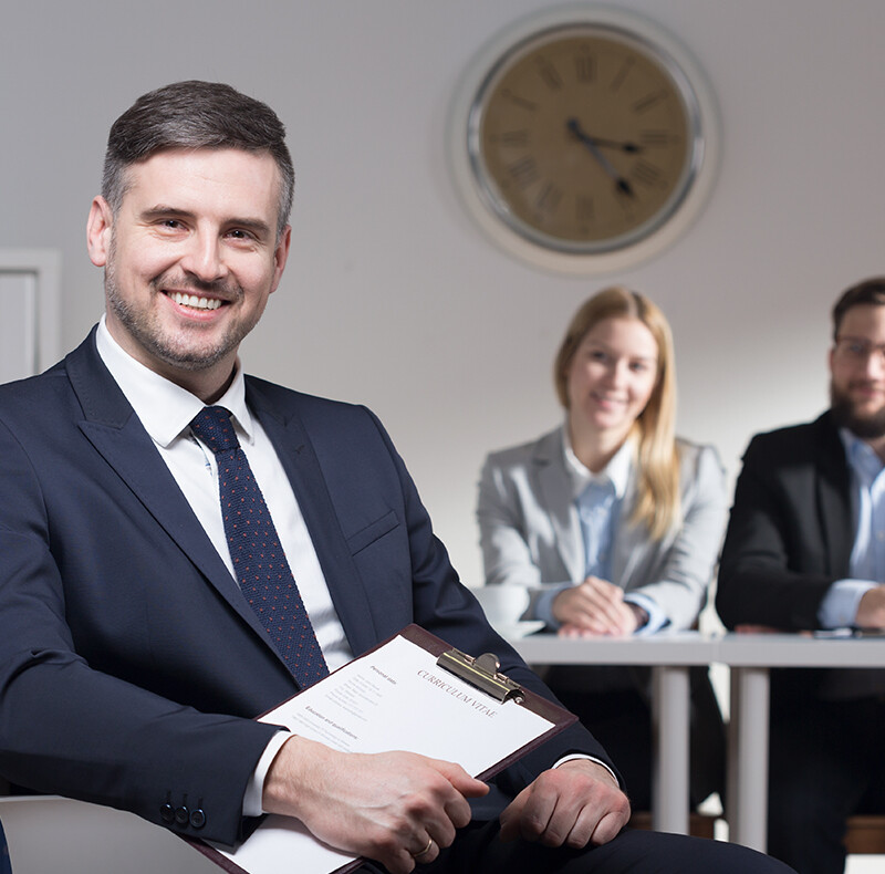 Man Holding Paperwork Man Holding Paperwork