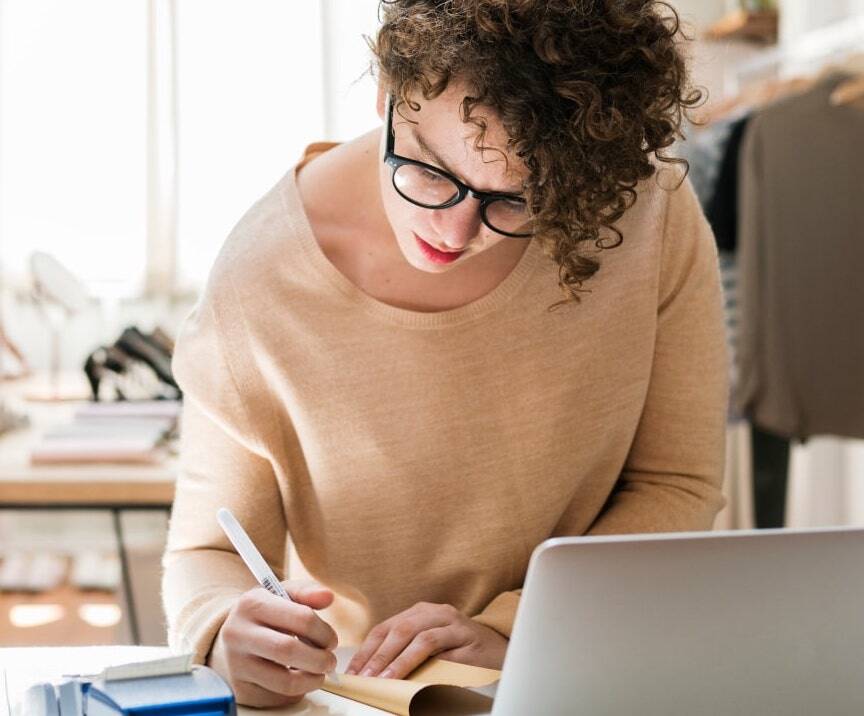Woman Working in Clothing Business Woman Working in Clothing Business